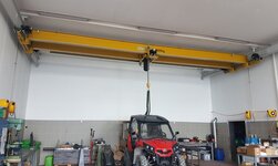 Double bridge suspended crane with electric chain hoist in workshop