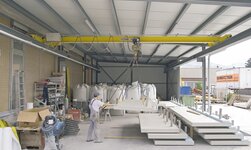 Electric chain hoist lifts concrete element