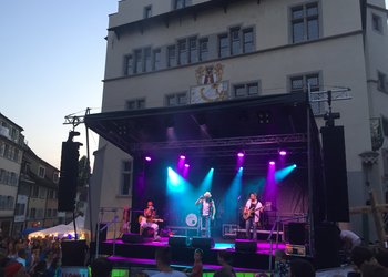 Electric chain hoists LP carry loudspeaker towers onto outdoor stage