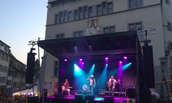 Electric chain hoists LP carry loudspeaker towers onto outdoor stage