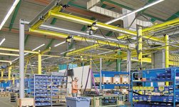 Underslung travelling cranes with electric chain hoists  in production facility