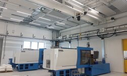 Overhead travelling crane intermediate structure with electric chain hoist in production operation