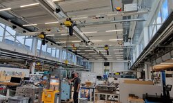 An injection moulding tool is loaded onto the stacker by crane