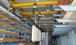 Transporting window frames with GIS overhead travelling cranes