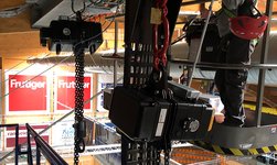 Motors with a large lifting height and frequency converters are used to lift and hold the video cube