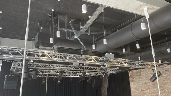 Stage system for light installations GIS motors hold a stage system for light installations and theatre curtains