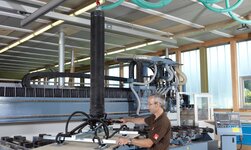 Aluminum crane system with Vacuhandling Aluminium crane system combined with tube lifter for lifting wooden panels