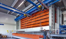double bridge suspended crane GISKB with saddle and parallel connection Crane system with synchronous electric chain hoists for lifting long goods
