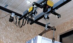 Light crane system double bridge suspended crane GISKB with low headroom construction Crane system for the transport of a crate in wine production