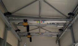 Overhead travelling crane with 2 crane bridges Electrically operated crane system in assembly hall