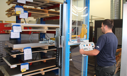Shelf storage operation unit with vacuum unit Crane system for lifting and moving metal plates