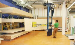 Plate transport with shelf storage operation unit Crane system for the efficient storage and retrieval of panels and pallets in the warehouse